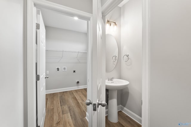 29414 Canoe Cir, Harvest, AL 35749 - bathroom featuring wood finished floors, a sink, and baseboards