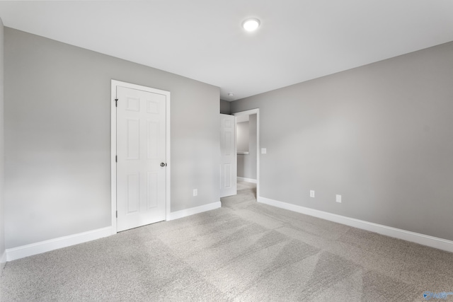 unfurnished bedroom with carpet