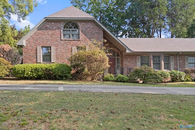 view of property with a front lawn