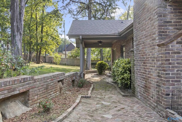 view of patio featuring ceiling fan