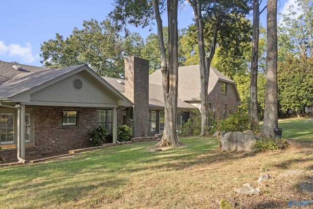 exterior space with a front lawn