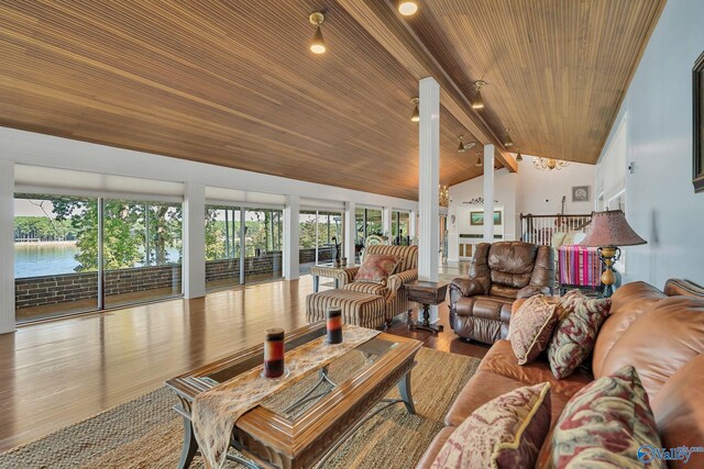 411 Darby Ave, Sheffield, AL 35660 - living area with vaulted ceiling, recessed lighting, a water view, wood ceiling, and wood finished floors