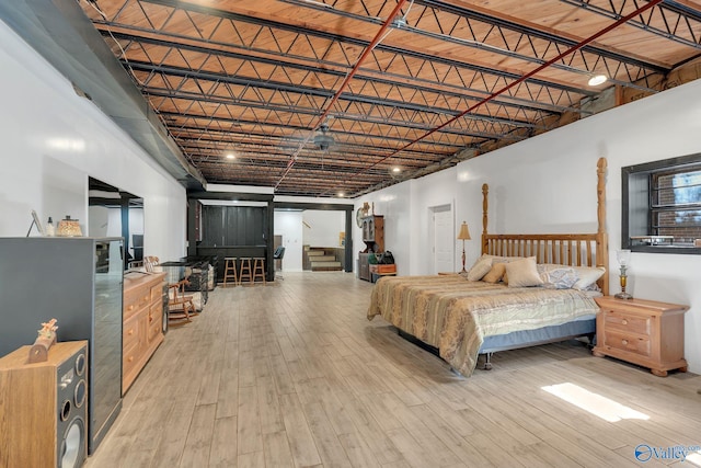 411 Darby Ave, Sheffield, AL 35660 - bedroom featuring a high ceiling and light wood-type flooring