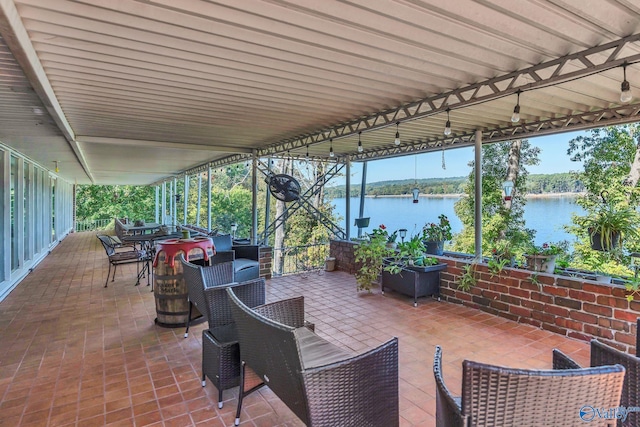 411 Darby Ave, Sheffield, AL 35660 - view of patio / terrace with outdoor dining area and a water view