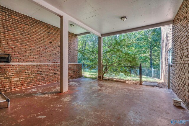 411 Darby Ave, Sheffield, AL 35660 - view of patio with a gate and fence