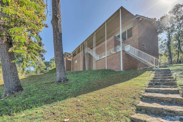 411 Darby Ave, Sheffield, AL 35660 - view of side of property featuring stairway and a yard