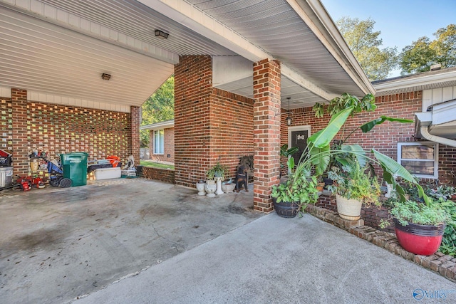 411 Darby Ave, Sheffield, AL 35660 - view of patio / terrace with a carport and concrete driveway