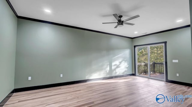 spare room featuring crown molding, ceiling fan, and light hardwood / wood-style floors