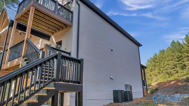 view of home's exterior featuring cooling unit