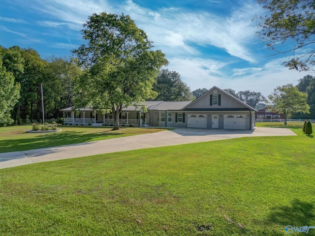 ranch-style home featuring a garage and a front yard