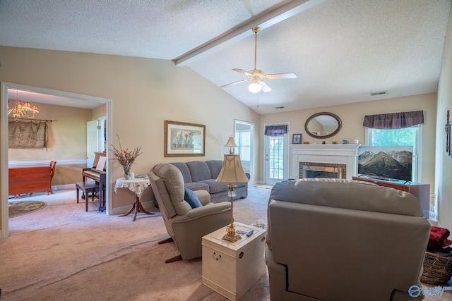 142 Raspberry Way, Madison, AL 35757 - living area featuring light colored carpet, a ceiling fan, a fireplace, a chandelier, and a textured ceiling