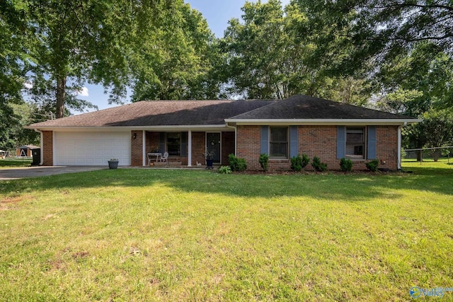 142 Raspberry Way, Madison, AL 35757 - single story home featuring an attached garage, asphalt driveway, brick siding, and covered porch