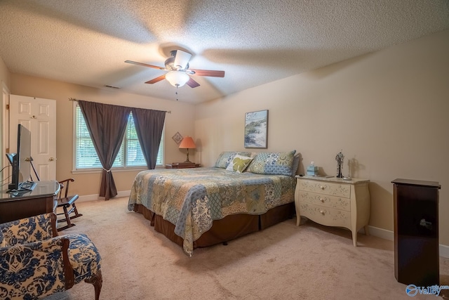 142 Raspberry Way, Madison, AL 35757 - bedroom with light carpet, ceiling fan, and a textured ceiling