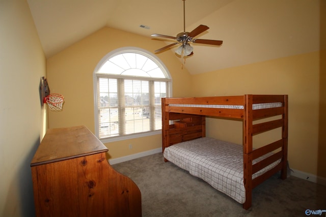 carpeted bedroom featuring vaulted ceiling and ceiling fan