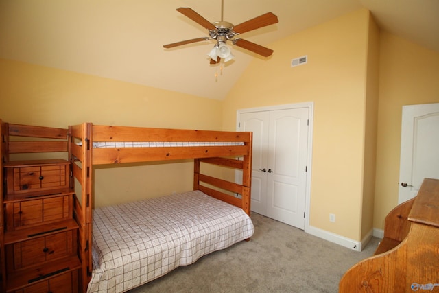 bedroom with lofted ceiling, light carpet, and ceiling fan