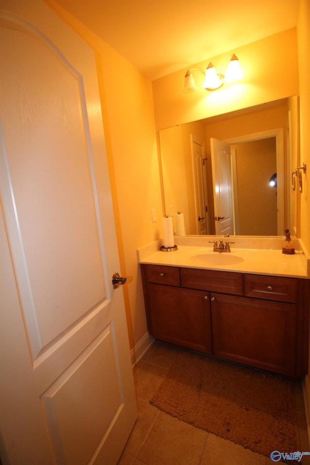 bathroom with vanity and tile patterned floors