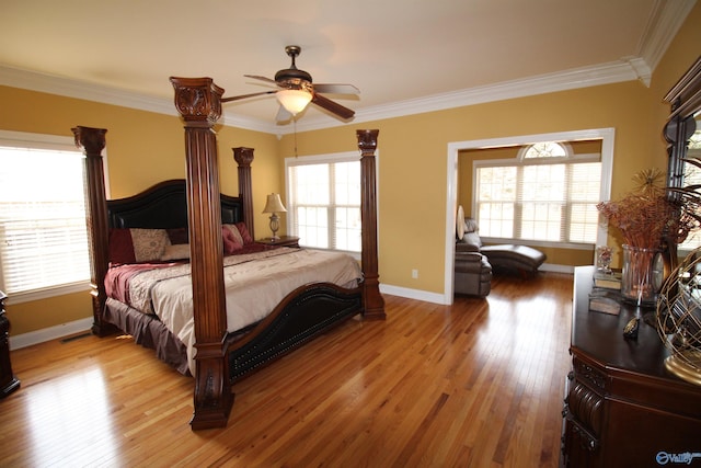 bedroom featuring ornamental molding and light wood-type flooring