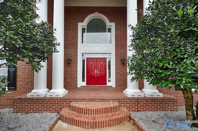 doorway to property featuring a porch