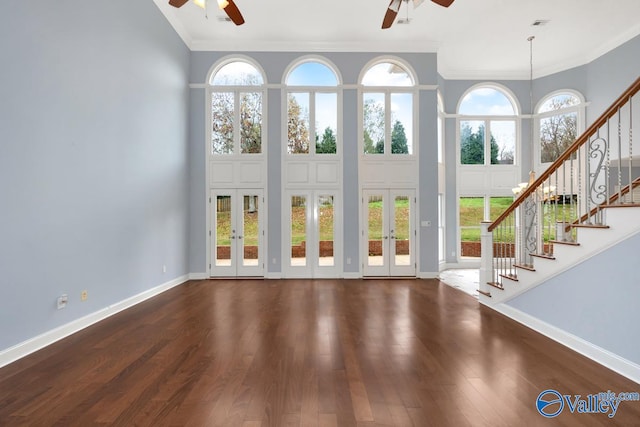 interior space featuring a wealth of natural light, french doors, and hardwood / wood-style floors