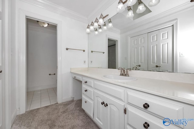 bathroom with tile patterned floors, crown molding, and vanity