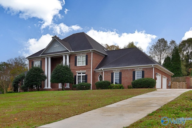 greek revival house with a front yard