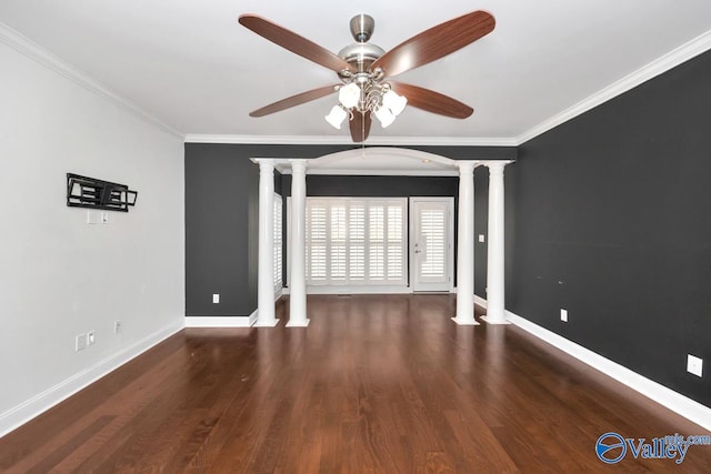 unfurnished living room with dark hardwood / wood-style flooring, ornate columns, and ornamental molding