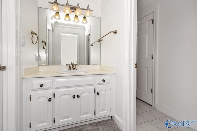 bathroom featuring tile patterned flooring and vanity