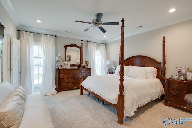 carpeted bedroom with a ceiling fan, recessed lighting, and visible vents