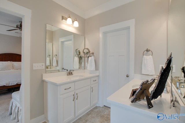 bathroom featuring ensuite bath, ceiling fan, and vanity