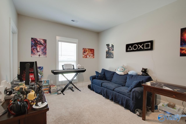 living room with visible vents and carpet flooring