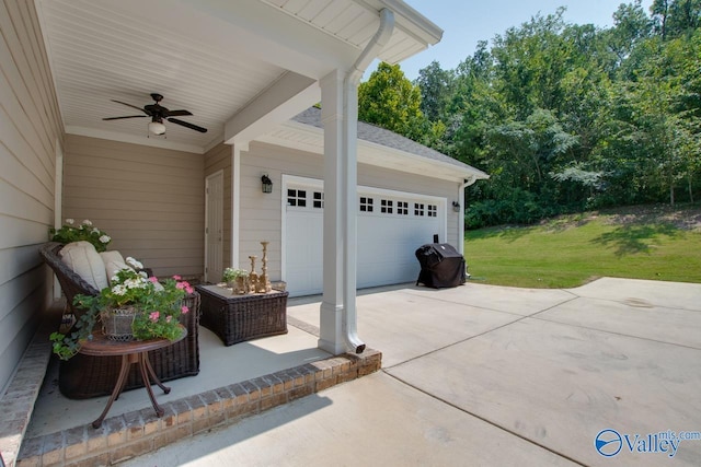 view of patio / terrace featuring a garage, concrete driveway, area for grilling, and a ceiling fan