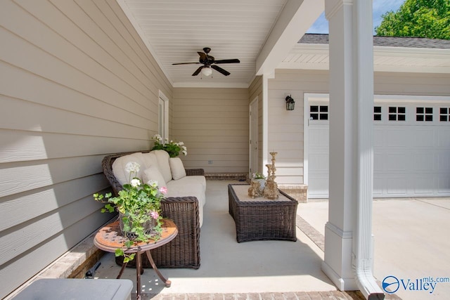 view of patio featuring a ceiling fan, an attached garage, and an outdoor hangout area