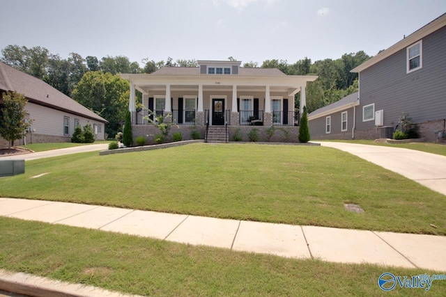 view of front facade featuring a porch and a front yard