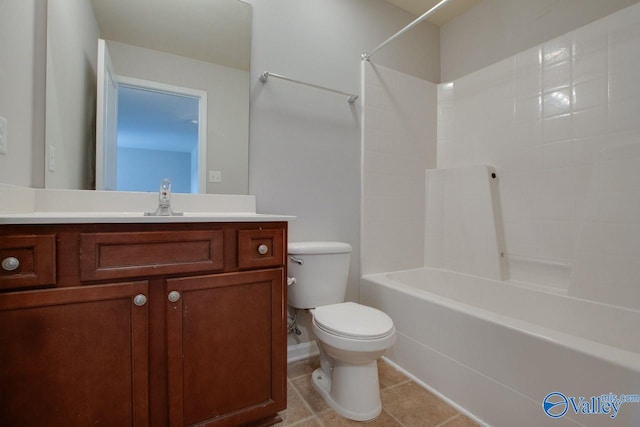 full bathroom with tub / shower combination, toilet, vanity, and tile patterned floors