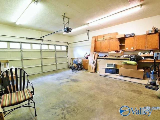 garage featuring a garage door opener