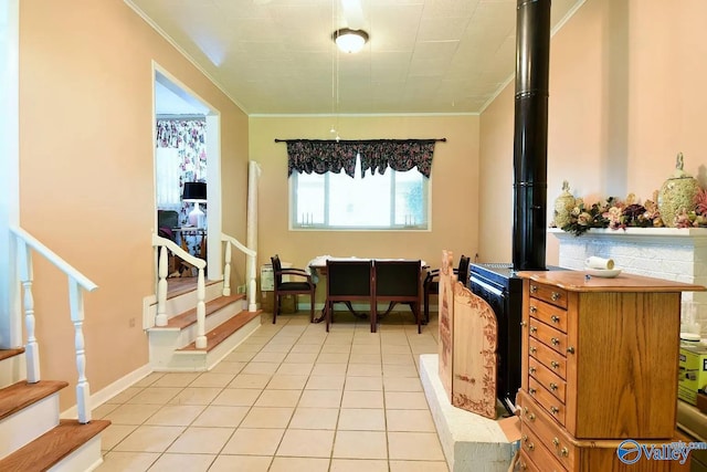 interior space featuring ornamental molding and light tile patterned flooring