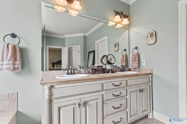 bathroom with tile patterned flooring, ornamental molding, and dual bowl vanity