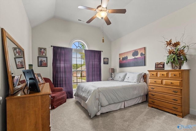 bedroom featuring ceiling fan, vaulted ceiling, light colored carpet, and visible vents