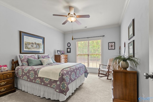 bedroom with light colored carpet, ornamental molding, and ceiling fan