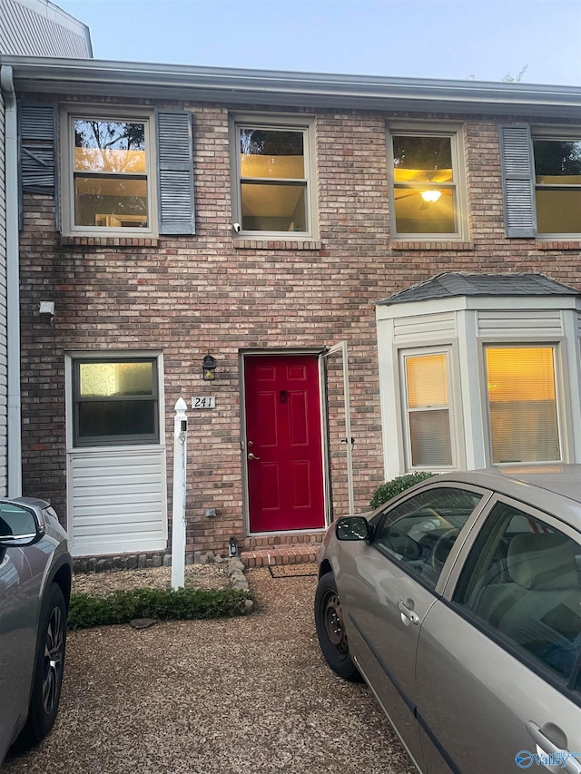 view of front of property featuring brick siding