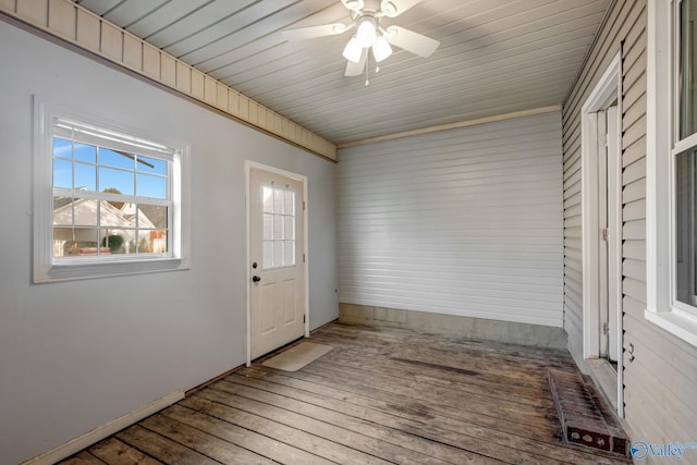 foyer with ceiling fan and hardwood / wood-style floors