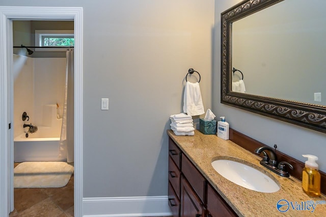 bathroom with shower / tub combo with curtain, vanity, and tile patterned flooring