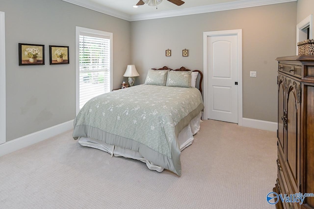 bedroom with light colored carpet, ornamental molding, and ceiling fan