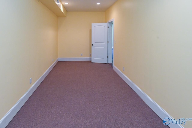 unfurnished room with carpet floors