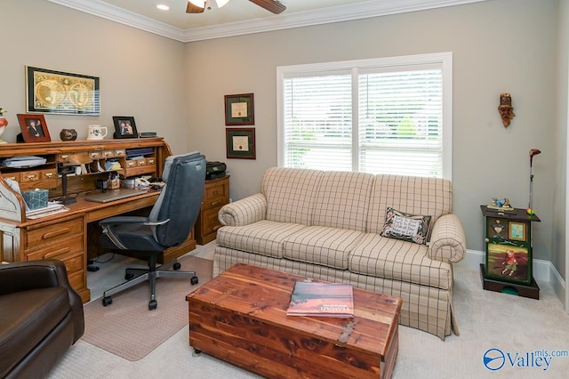 carpeted office space with crown molding and ceiling fan