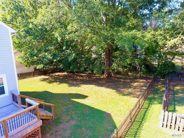 view of yard featuring a deck