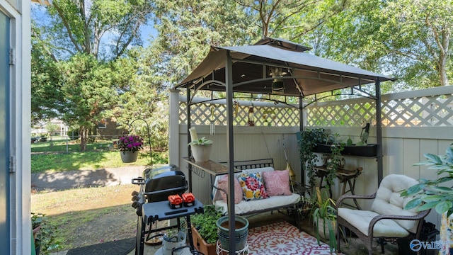 11112 Memorial Pkwy S Unit N3, Huntsville, AL 35803 - fenced backyard with a gazebo and grilling area