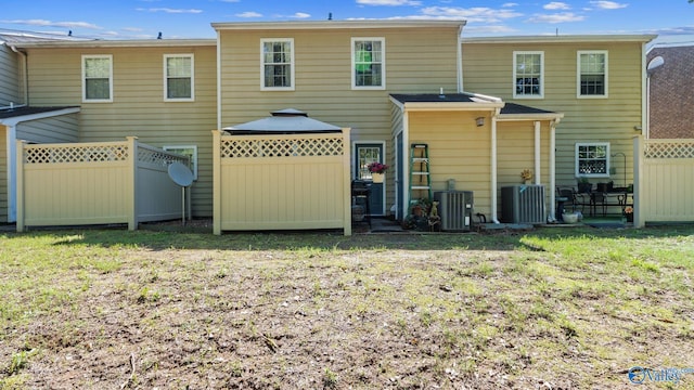 11112 Memorial Pkwy S Unit N3, Huntsville, AL 35803 - rear view of house with central AC unit and a gazebo