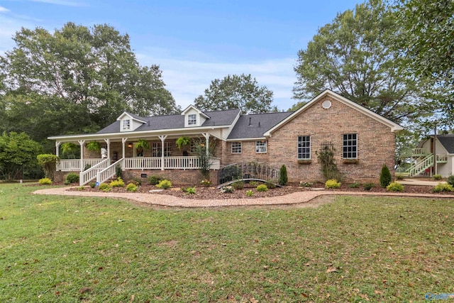 view of front of property with a front lawn and a porch