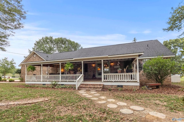 single story home with a porch